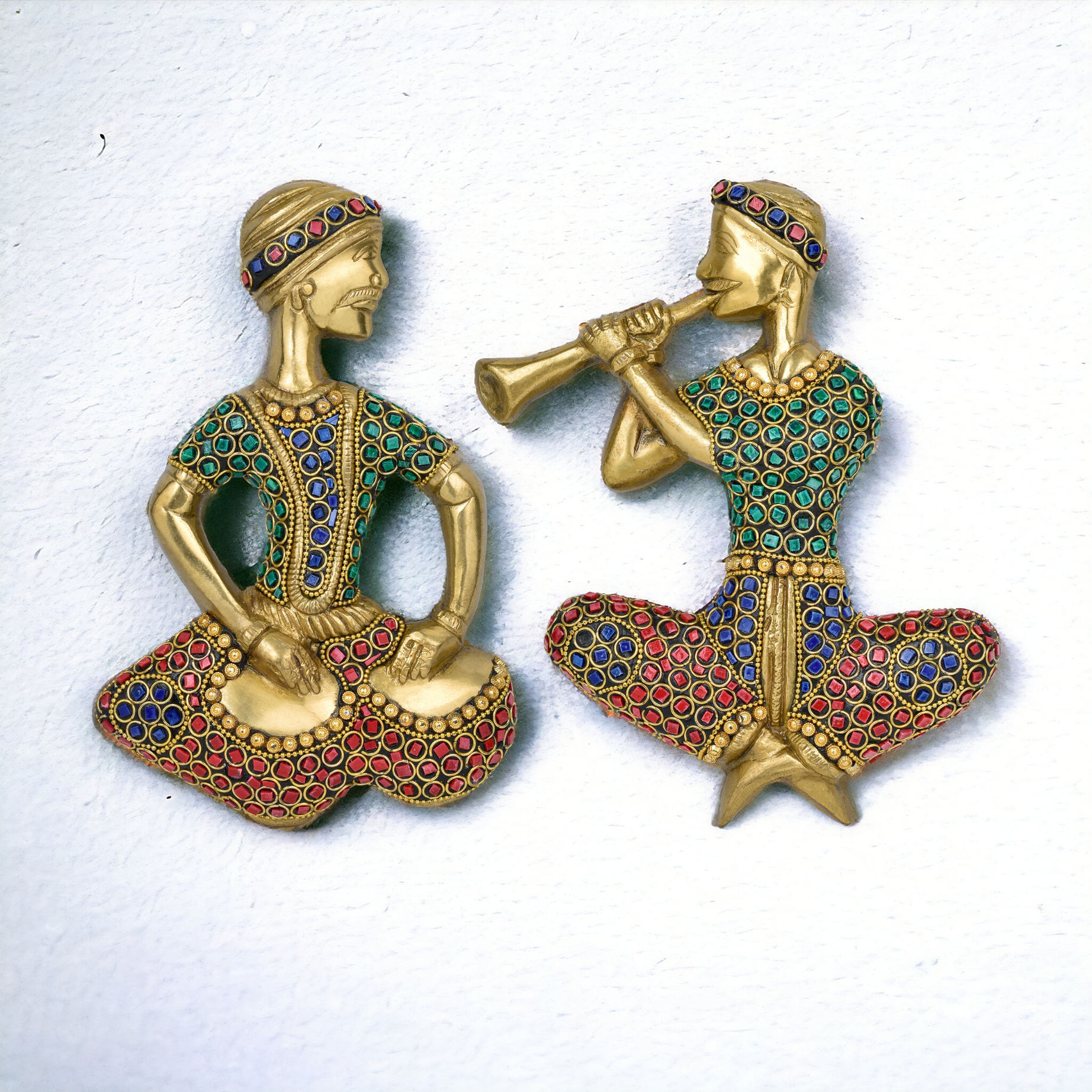 Brass musician figurative pair with stones